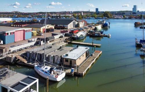 a group of boats docked at a marina at Stunning Ship In Göteborg With Sauna in Gothenburg