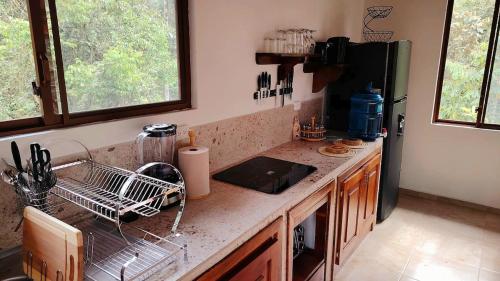 Een keuken of kitchenette bij Luli Wasi