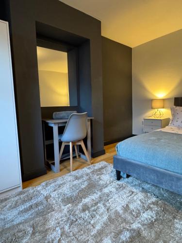 Ένα ή περισσότερα κρεβάτια σε δωμάτιο στο One bedroom basement flat