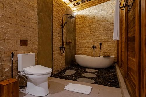 Ένα μπάνιο στο Griya Dukuh Ubud Villa