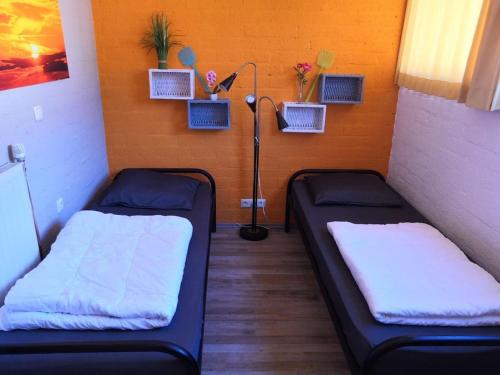 Ένα ή περισσότερα κρεβάτια σε δωμάτιο στο Holiday home with 2 bedrooms