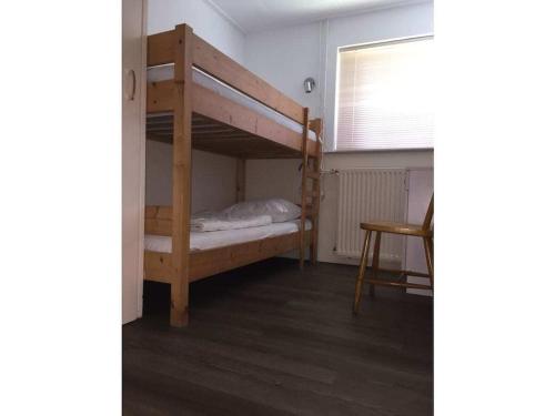 En eller flere senge i et værelse på 1-bedroom bungalow