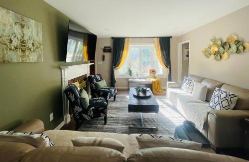 a living room with a couch and a fireplace at Private Estate, walk to Princeton downtown, 3 Bedrooms, 2 Bath, with Free Parking in Princeton