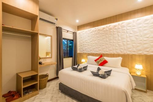 Katil atau katil-katil dalam bilik di Pinthong Aonang Villa