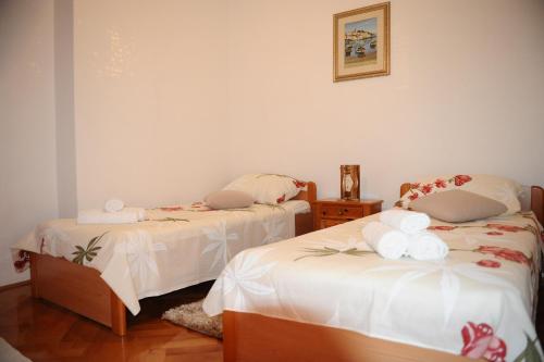 Postel nebo postele na pokoji v ubytování Zadar Dream