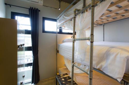 Postel nebo postele na pokoji v ubytování Bloo Hostel