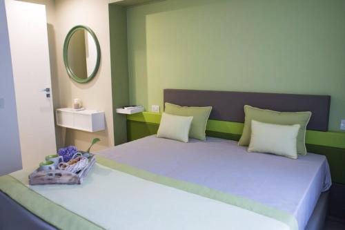 Relais del Corso tesisinde bir odada yatak veya yataklar