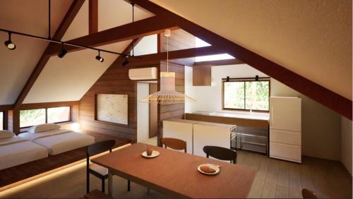 a bedroom with a bed and a table and a dining room at Kurasako Onsen Sakura in Minamioguni