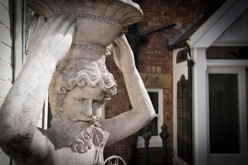 a statue of a man holding a vase at Brockley Hall Hotel in Saltburn-by-the-Sea