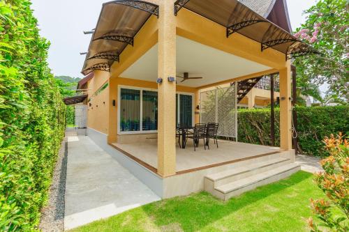 Κήπος έξω από το Blue Haven Bay Villa 21C