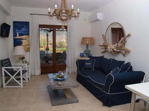 A seating area at Melograno Apartments and Studios