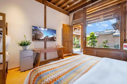 Katil atau katil-katil dalam bilik di Jian Chuan Sha Xi Sha Ping Having You In This Life NO.2Courtyard