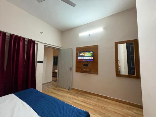 Ένα ή περισσότερα κρεβάτια σε δωμάτιο στο Himalayan home stay