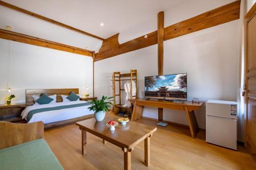 Televisyen dan/atau pusat hiburan di Jian Chuan Sha Xi Sha Ping Having You In This Life NO.2Courtyard