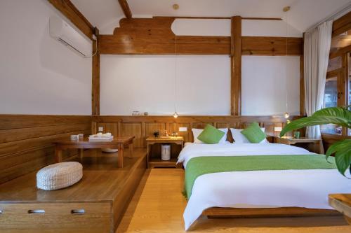 Katil atau katil-katil dalam bilik di Jian Chuan Sha Xi Sha Ping Having You In This Life NO.2Courtyard