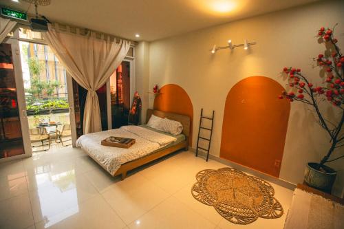 Ένα ή περισσότερα κρεβάτια σε δωμάτιο στο Iris Homestay Bình Dương