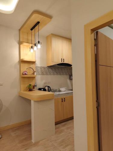 Kuchyň nebo kuchyňský kout v ubytování Baan Check In