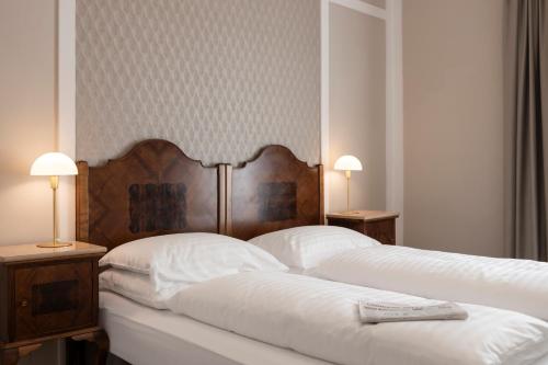 Postel nebo postele na pokoji v ubytování Hotel Europa Splendid