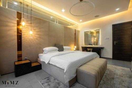 Ένα ή περισσότερα κρεβάτια σε δωμάτιο στο Dinmahomes