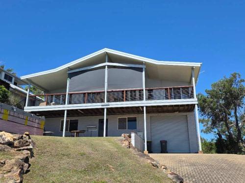 a large house on top of a hill at Sandy Ridge Holiday House in Seventeen Seventy