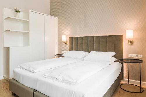 Postel nebo postele na pokoji v ubytování Hotel Europa Splendid