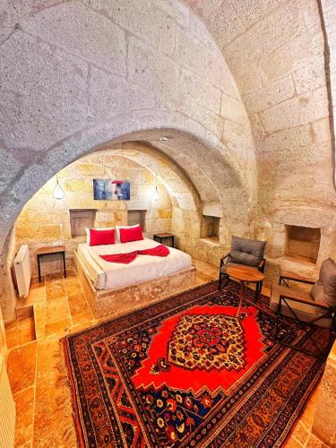 Ένα ή περισσότερα κρεβάτια σε δωμάτιο στο Crimson Cappadocia