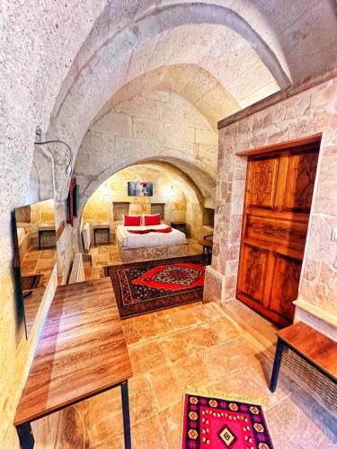 Ένα ή περισσότερα κρεβάτια σε δωμάτιο στο Crimson Cappadocia