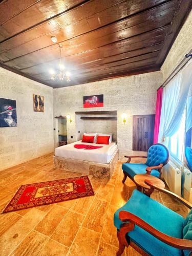 Ένα ή περισσότερα κρεβάτια σε δωμάτιο στο Crimson Cappadocia