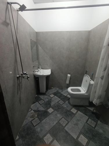 Ένα μπάνιο στο Bin-Umar Guest House