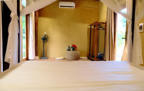 Ένα ή περισσότερα κρεβάτια σε δωμάτιο στο The Valley Farmstay