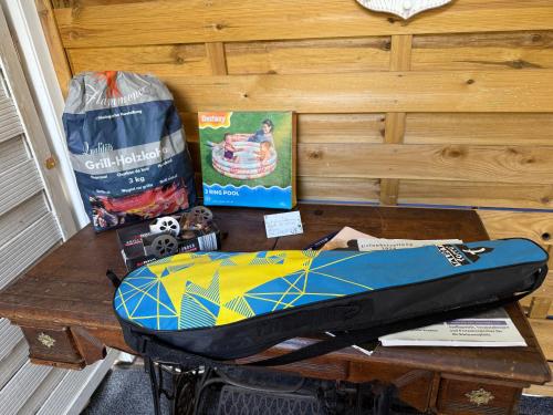 a table with a boat on top of it at Landhaus am See Flecken Zechlin in Rheinsberg