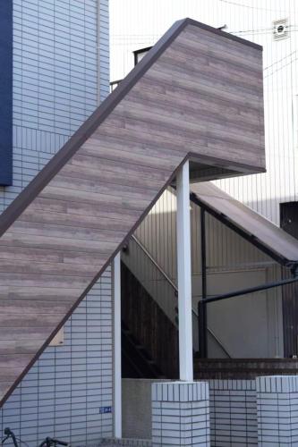 awning of a building in front of a tall building at D Regalo in Ichikawa