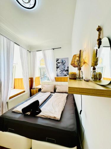 Ένα ή περισσότερα κρεβάτια σε δωμάτιο στο Beautiful Stay, 10BR Shared Apartment Flat 8 Mins Rathausplatz