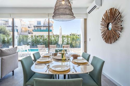 Φωτογραφία από το άλμπουμ του Azure Leda Villa στο Παραλίμνι