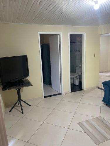 TV/trung tâm giải trí tại Casa do Aconchego