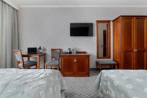 Letto o letti in una camera di Hotel&Spa Stary Dziwnów basen swimming pool
