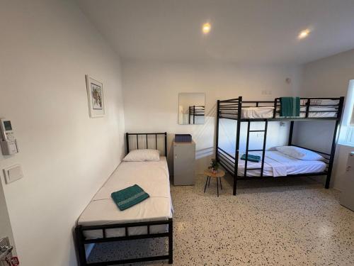 Cama o camas de una habitación en Windmill Hostel