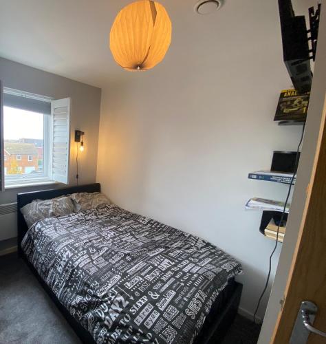 Ένα ή περισσότερα κρεβάτια σε δωμάτιο στο Cosy room near all amenities with free parking and WiFi