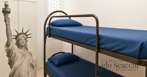 Katil atau katil-katil dalam bilik di Lido degli Scacchi Sea view Apartment - Beach included
