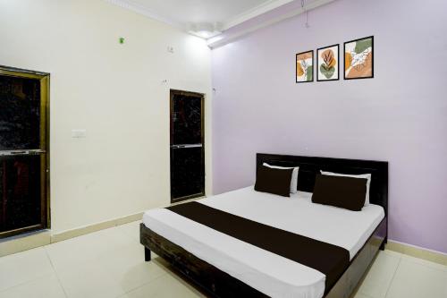 Ένα ή περισσότερα κρεβάτια σε δωμάτιο στο Hotel O STAY INN
