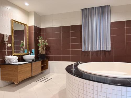 Salle de bains dans l'établissement Lisa Motel