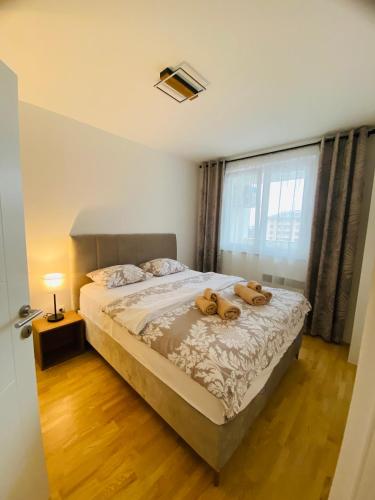 Postel nebo postele na pokoji v ubytování Apartman Urban Panorama