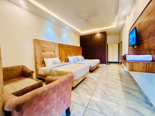Cama o camas de una habitación en Hotel On The Edge Top Rated & Awarded Property
