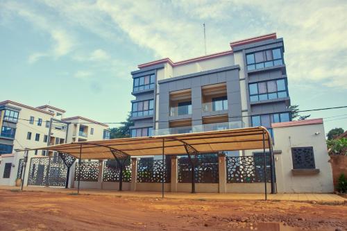 a building with a gate in front of it at TWINS RESIDENCE Niamey in Niamey
