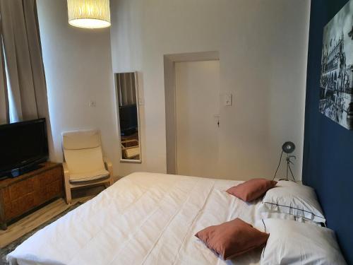 Кровать или кровати в номере HAPPY DAYS APARTHOTEL Krakow