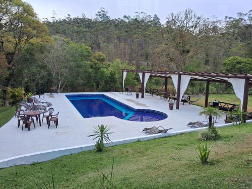 Kolam renang di atau dekat dengan Chale Rio Nascente