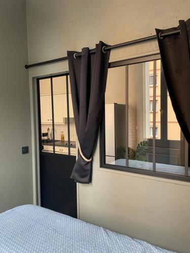 T2 cosy avec vue Pont des Catalans-Saint Cyprien