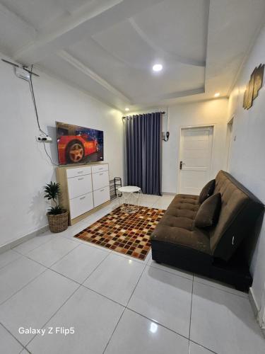 Гостиная зона в Erigeron homestay dieng