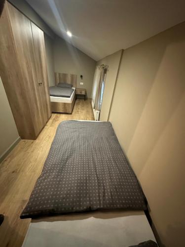 Кровать или кровати в номере Apartman Mia Tereza