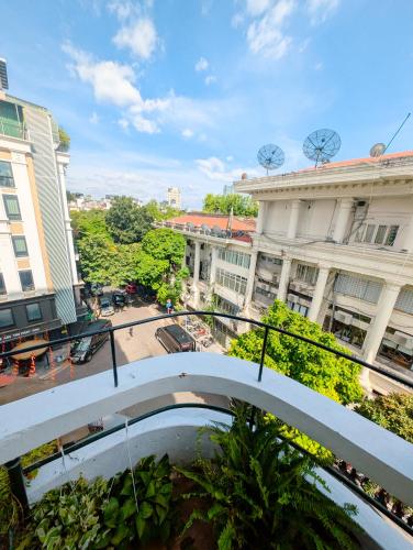a view of a city street with buildings at Maison Maravelle Hotel - Boutique Stay in Hanoi Old Quarter in Hanoi